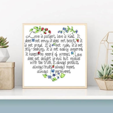 Le coeur en citation (L'Amour est Patient) - 31x28 cm - Kit de broderie Kit de broderie au point de croix Brodeuses.com